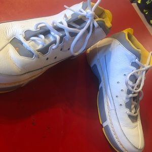 Jordans Size 10. Color: white and yellow